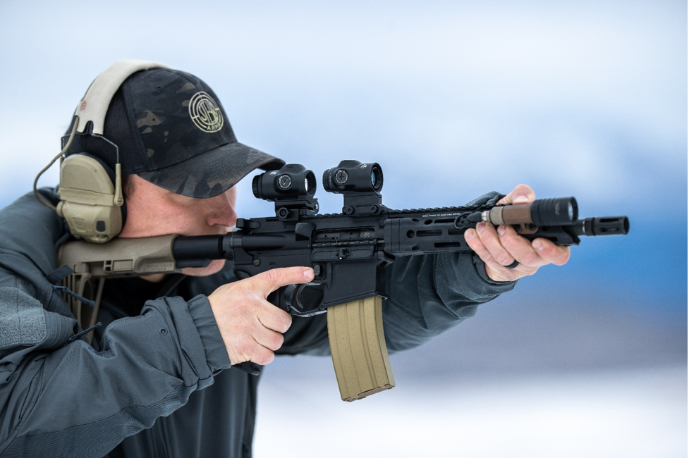 AR15 with a red dot sight and magnifier. Photo courtesy Primary Arms.